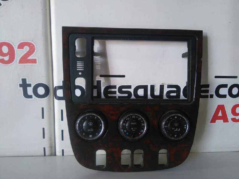 CARCASA CENTRAL DE RADIO Y CLIMA foto 4