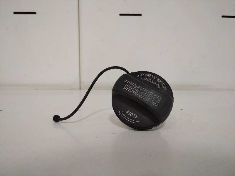 TAPON COMBUSTIBLE
